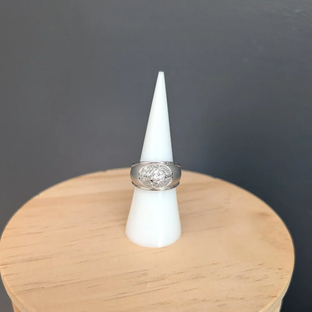 Matte brushed silver tone and faux diamond wide band ring